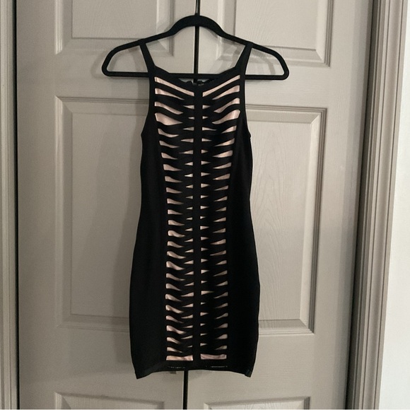 bebe Dresses & Skirts - bebe Black and Strappy Mini Dress